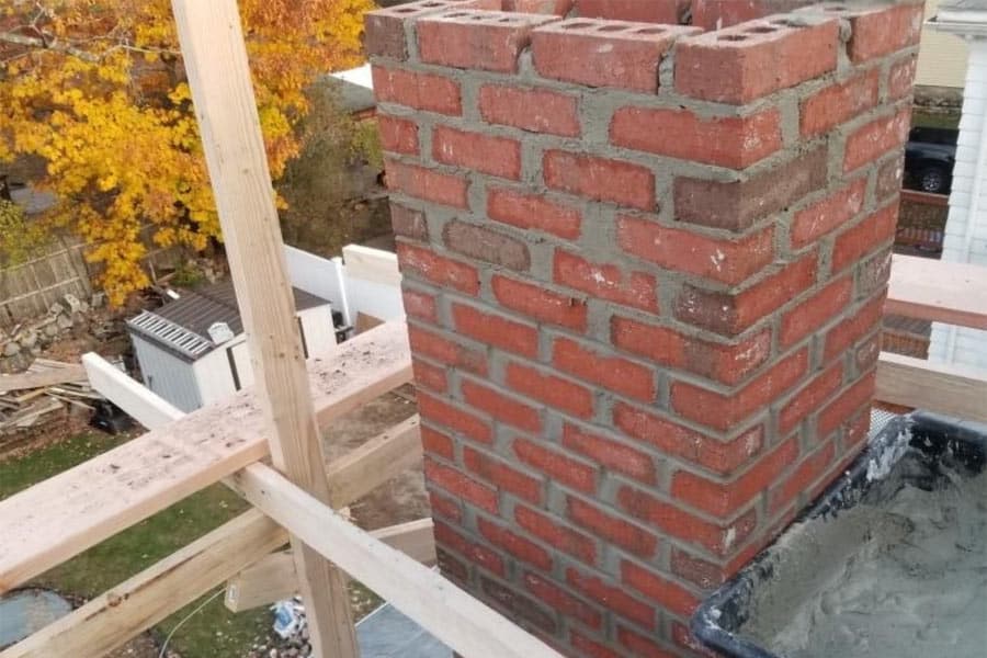 chimney repairs & rebuild contractors framingham newton springfield worcester watertown massachusetts four seasons masonry & roofing